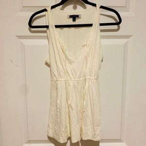 AO cream colored tank top with tie around back